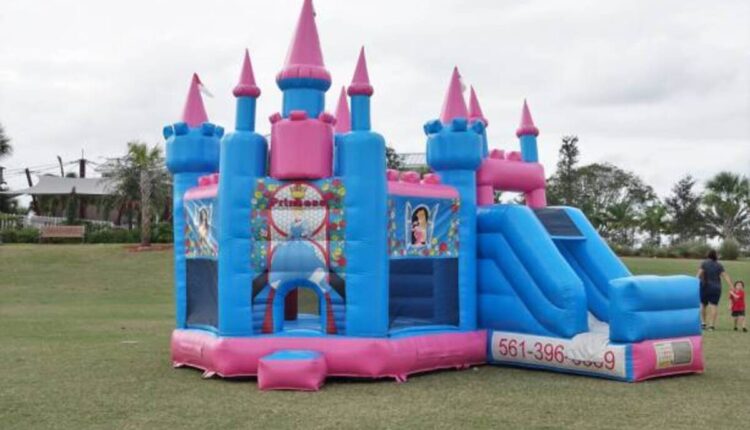 Pink Bounce House With Water Slide